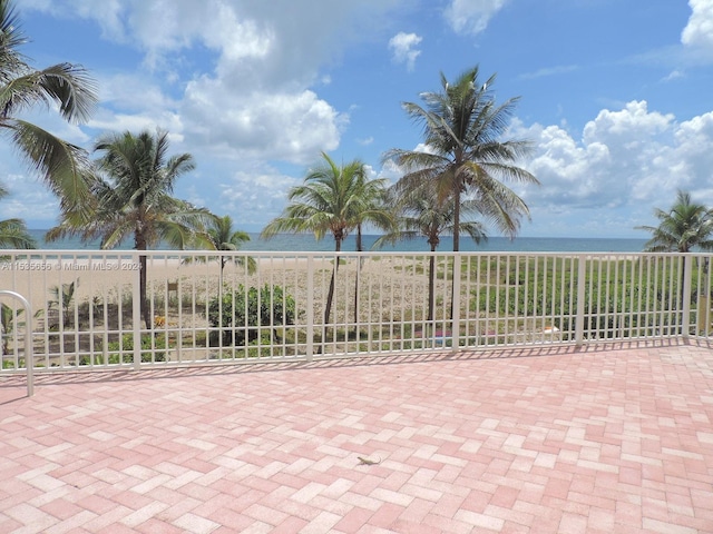 view of patio / terrace featuring a water view