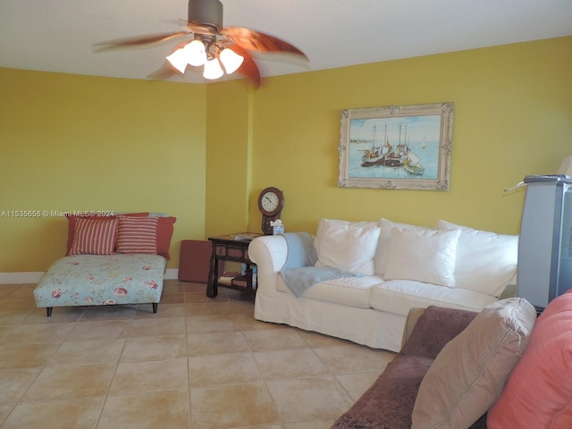 tiled living room with ceiling fan