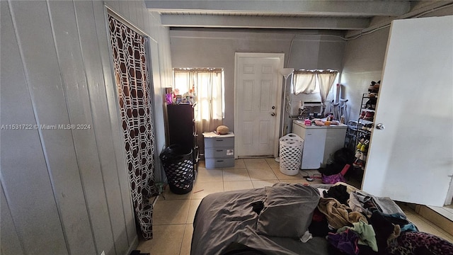 bedroom with light tile flooring