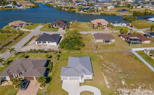 drone / aerial view featuring a water view