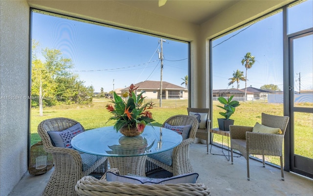 sunroom / solarium with a healthy amount of sunlight