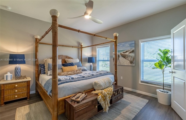 bedroom featuring ceiling fan and dark hardwood / wood-style flooring