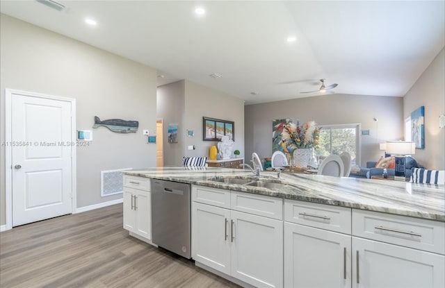 kitchen with light stone countertops, ceiling fan, white cabinetry, dishwasher, and sink