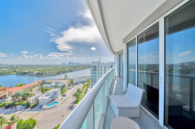 balcony featuring a water view