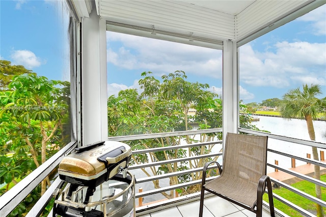 sunroom with a water view