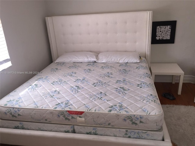 bedroom featuring hardwood / wood-style flooring