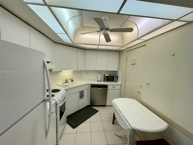 kitchen with white cabinetry, sink, ceiling fan, stainless steel appliances, and light tile patterned floors