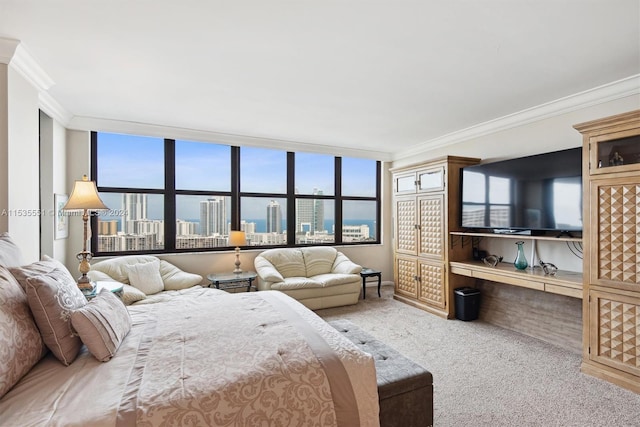 carpeted bedroom with ornamental molding