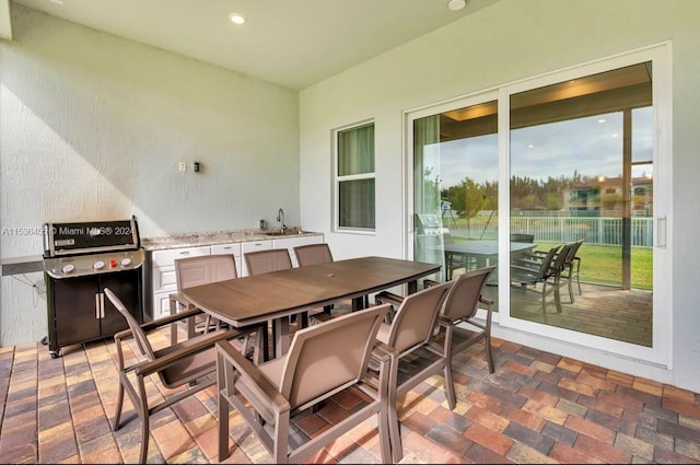 view of patio / terrace with sink and a grill