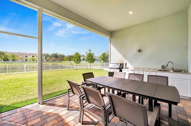 sunroom with sink