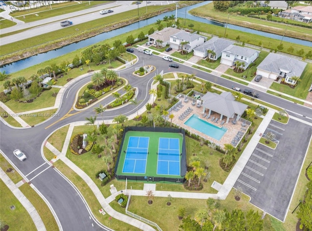 birds eye view of property featuring a water view