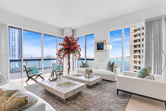 living room featuring a water view