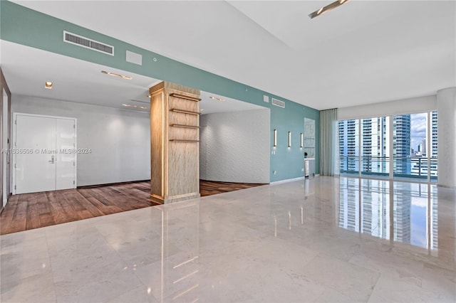 empty room with tile floors