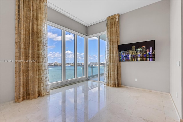 tiled empty room with a water view