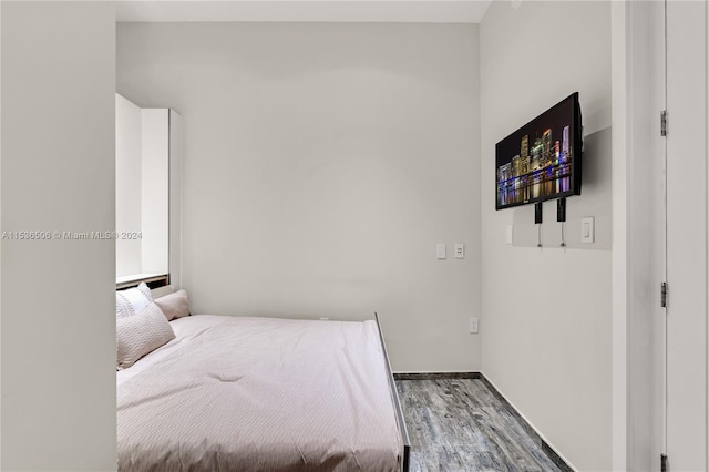 bedroom featuring hardwood / wood-style floors