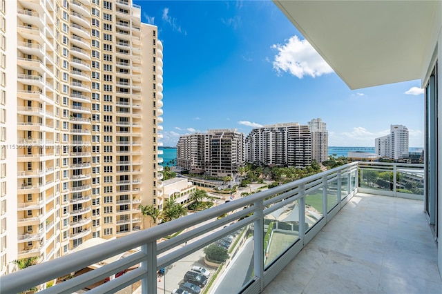 balcony featuring a water view