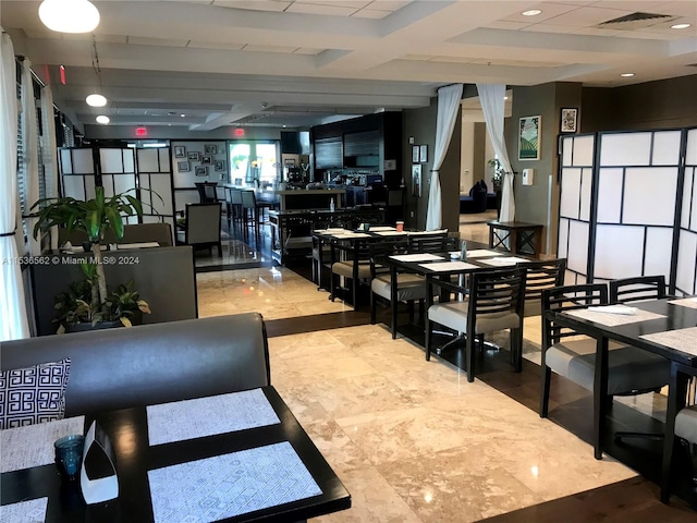 interior space with light tile floors and bar area