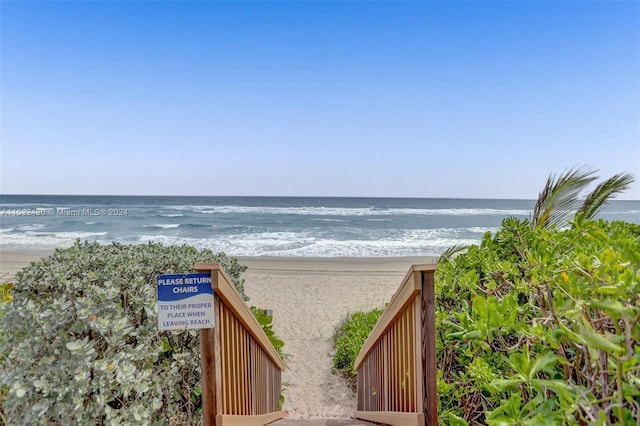 property view of water featuring a view of the beach