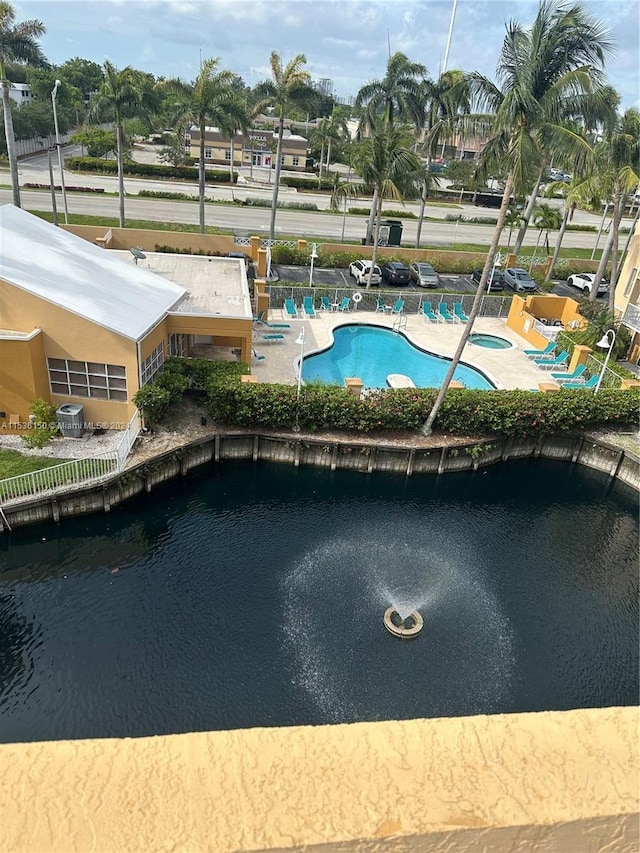 view of swimming pool featuring central AC