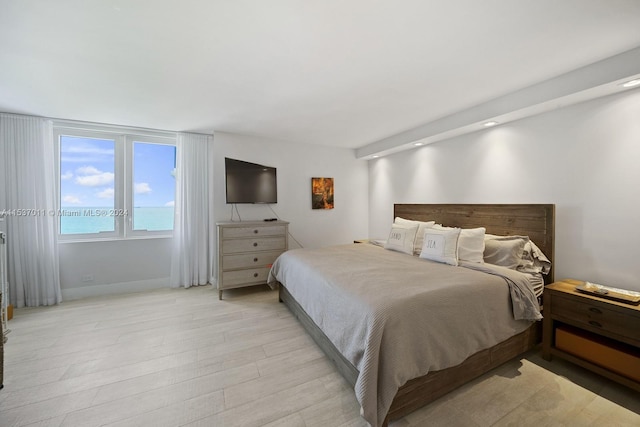 bedroom with light hardwood / wood-style floors