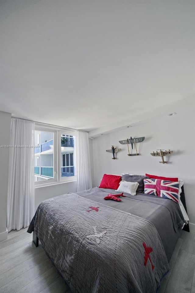 bedroom featuring light hardwood / wood-style floors