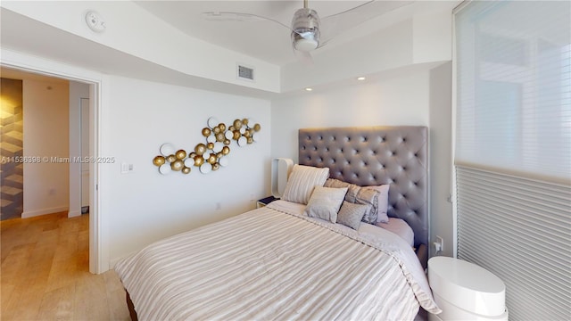 bedroom featuring ceiling fan and light wood-type flooring