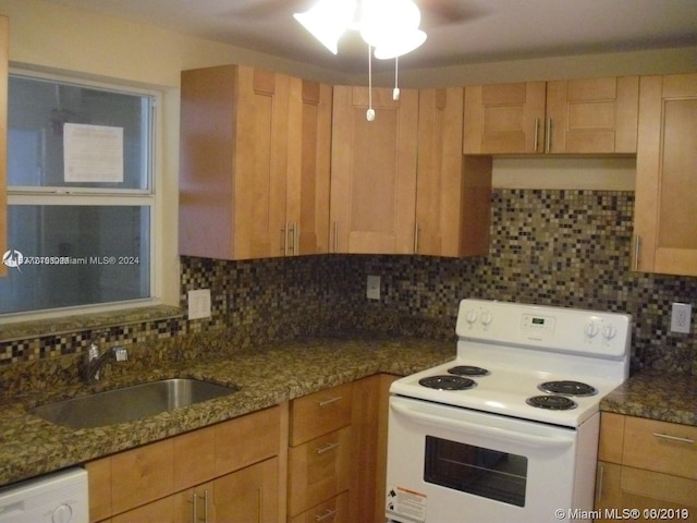 kitchen with dark stone countertops, white electric stove, tasteful backsplash, and ceiling fan