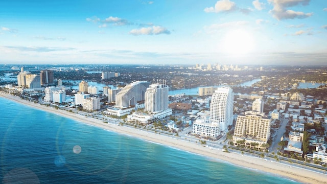 aerial view with a beach view and a water view