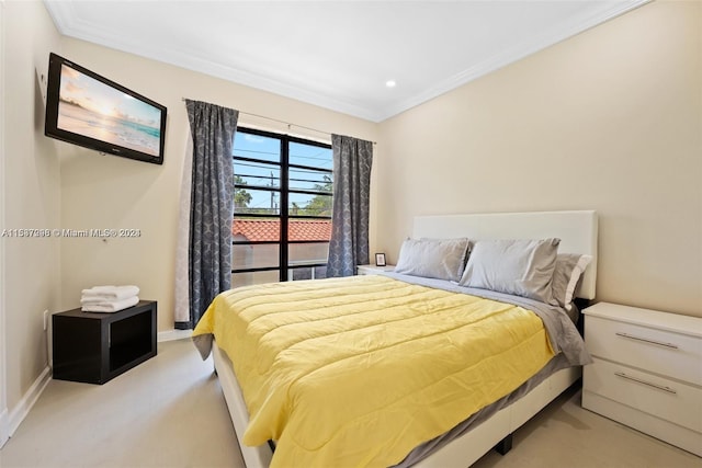 carpeted bedroom featuring ornamental molding