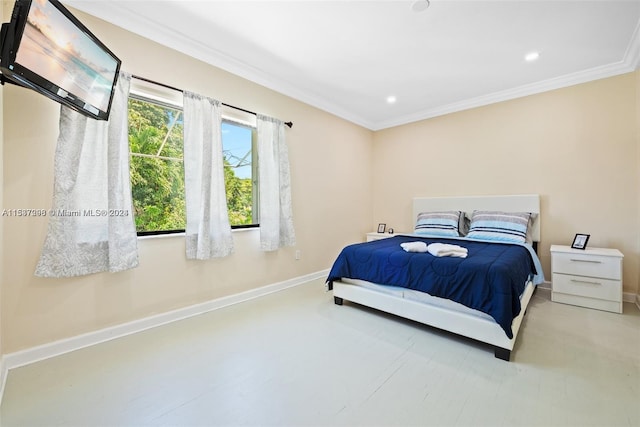 bedroom featuring crown molding