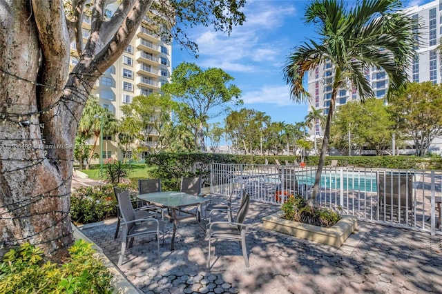 view of patio with a community pool