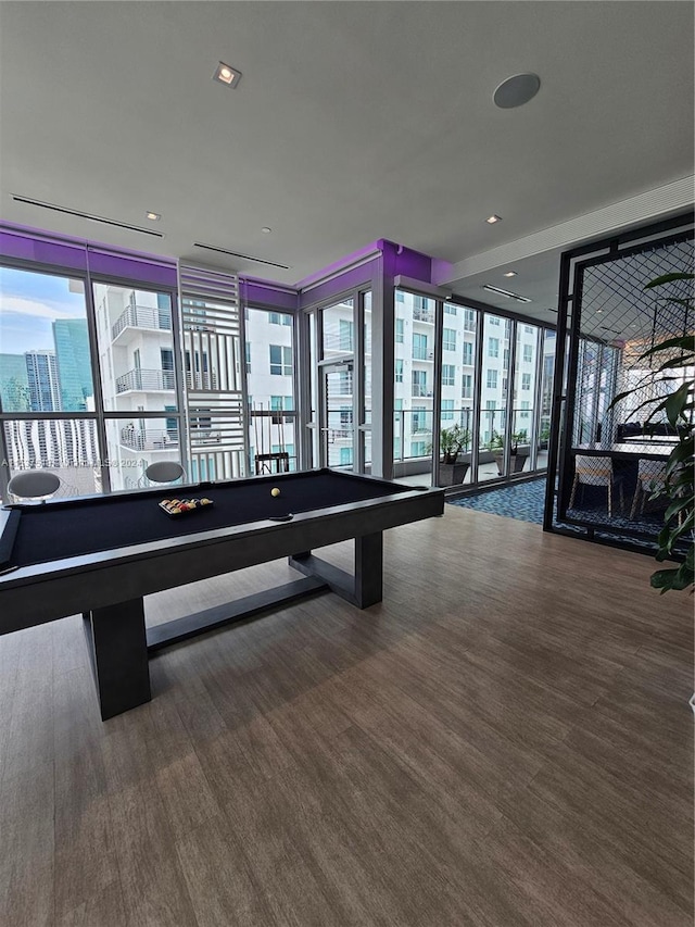 game room with floor to ceiling windows, billiards, and dark wood-type flooring