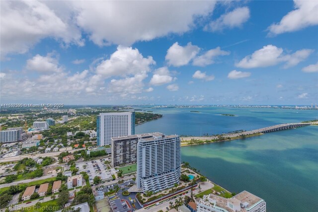 drone / aerial view with a water view and a city view