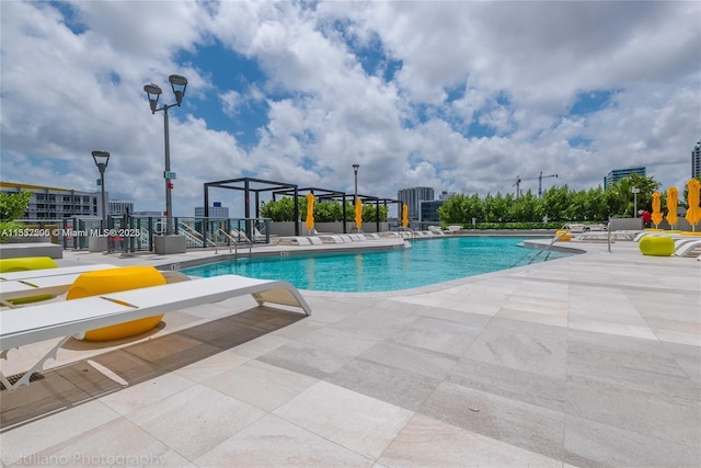 pool with a patio