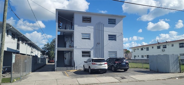 view of front of home with a balcony