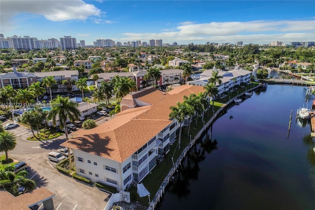 birds eye view of property featuring a water view