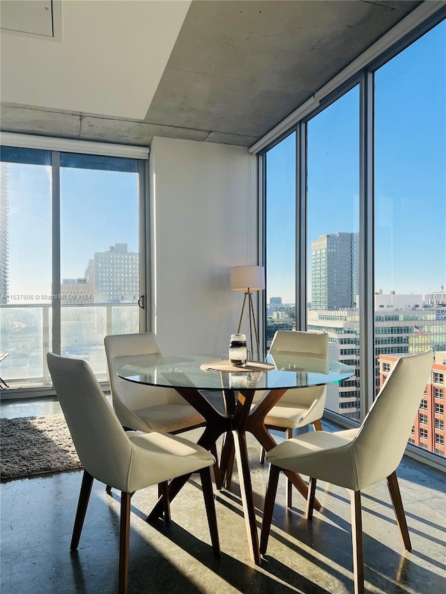 dining room featuring a wall of windows