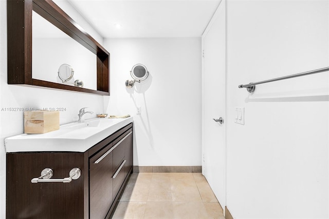 bathroom featuring tile floors and oversized vanity