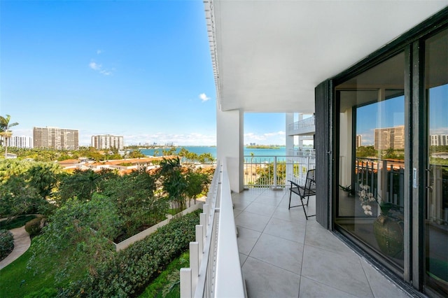 balcony featuring a water view