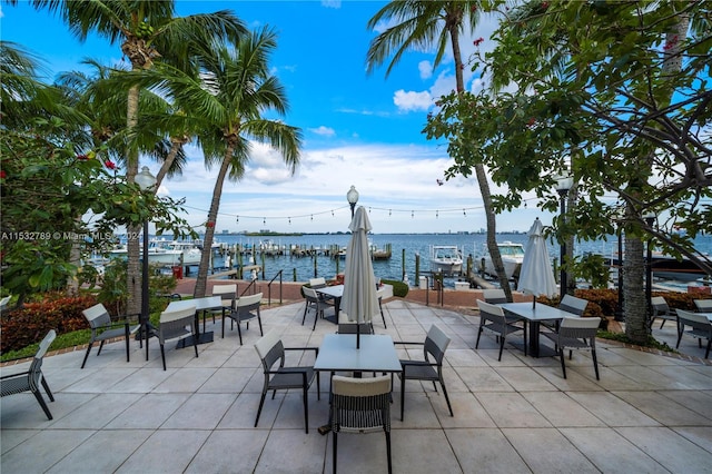 view of patio featuring a water view