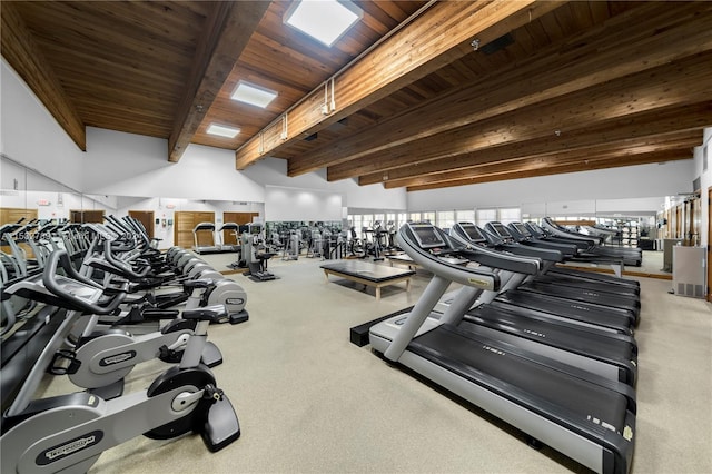 workout area featuring carpet flooring and wooden ceiling