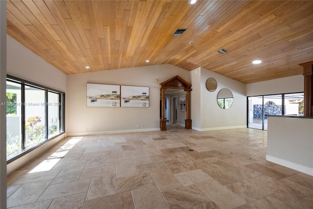 unfurnished living room featuring wooden ceiling, light tile floors, and lofted ceiling