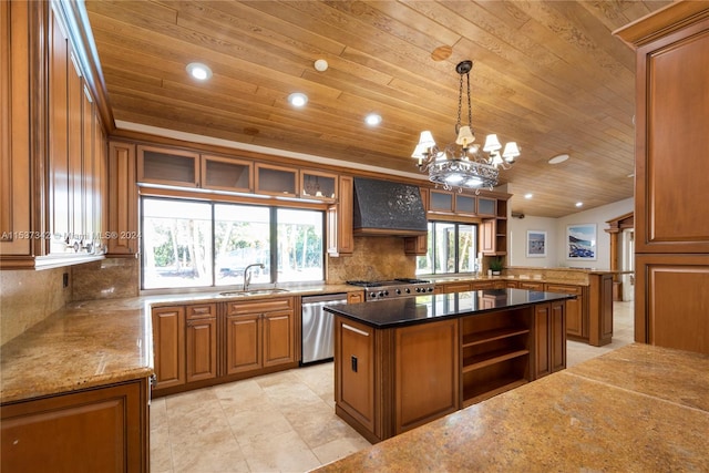 kitchen with an inviting chandelier, sink, premium range hood, a center island, and dishwasher