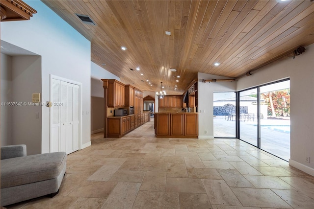 interior space with light tile floors, pendant lighting, wooden ceiling, and an inviting chandelier