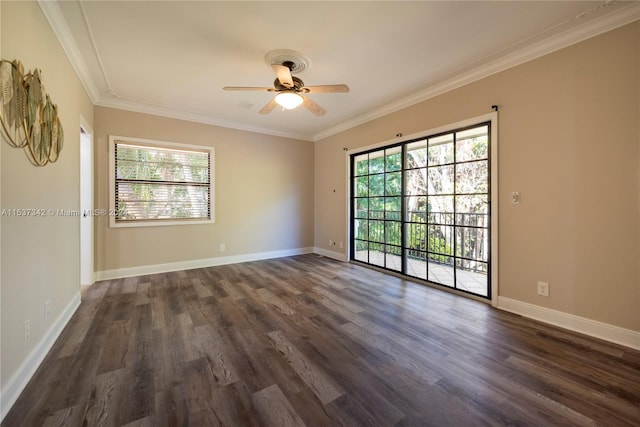 spare room with ornamental molding, ceiling fan, and dark wood-type flooring