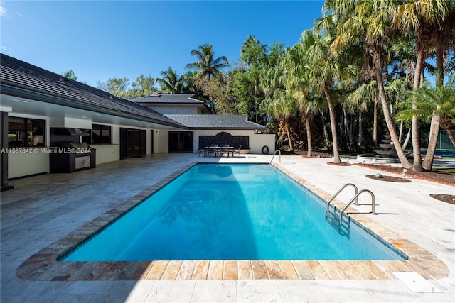 view of pool with a patio area