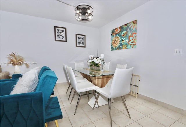 dining space featuring tile patterned floors