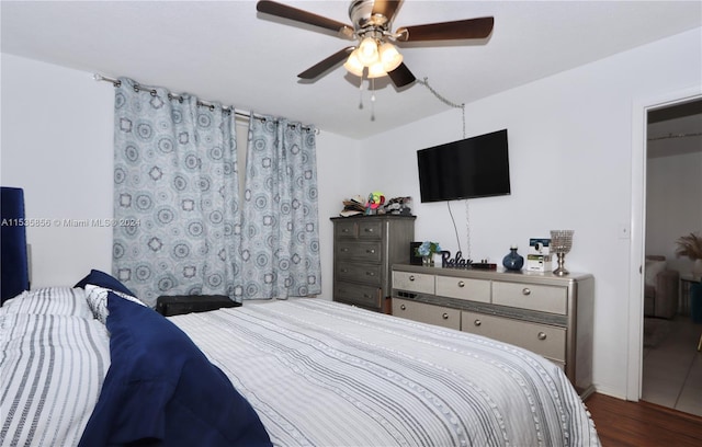 bedroom featuring hardwood / wood-style floors and ceiling fan