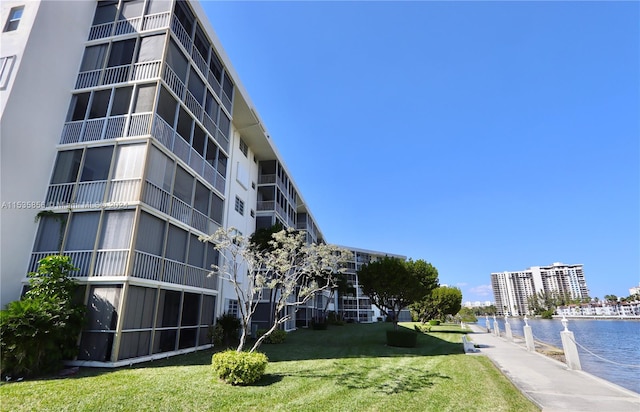 view of building exterior featuring a water view