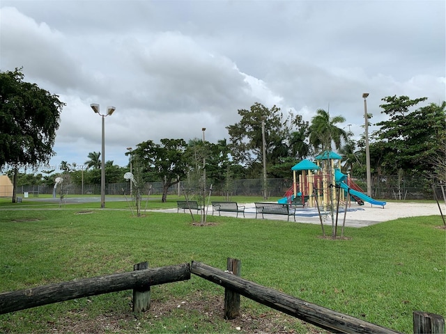 view of jungle gym featuring a yard